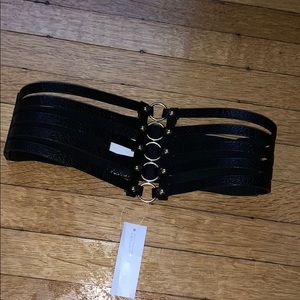 A black belt with cool looking design in front